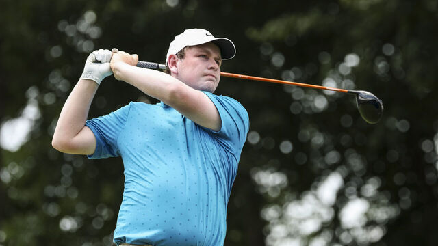 OWINGS MILLS, MARYLAND - AUGUST 15: Robert MacIntyre of Scotland plays a shot from the 15th tee during the second round of the BMW Championship at Caves Valley Golf Club on August 15, 2025 in Owings Mills, Maryland.
