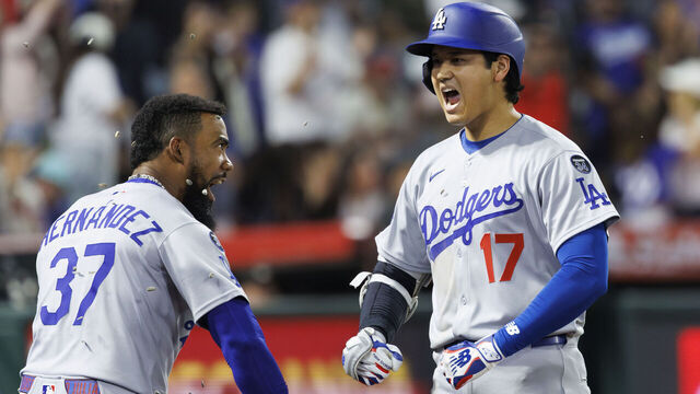 ANAHEIM, CA -AUGUST 12, 2025: Los Angeles Dodgers designated hitter Shohei Ohtani (17)reacts with Los Angeles Dodgers outfielder Teoscar Hernández (37) after hitting the go-ahead solo homer against the Angels in the ninth inning at Angel Stadium on August 12, 2025 in Anaheim, California.(Gina Ferazzi / Los Angeles Times via Getty Images)