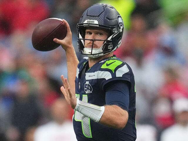 Seahawks quarterback Sam Darnold throwing a pass