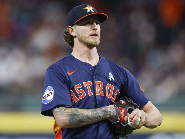 HOUSTON, TEXAS - JUNE 15: Josh Hader #71 of the Houston Astros looks on between pitches in the tenth inning during a game against the Minnesota Twins at Daikin Park on June 15, 2025 in Houston, Texas.
