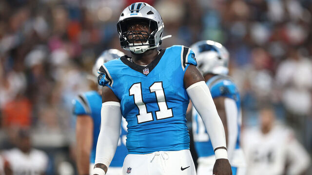 CHARLOTTE, NORTH CAROLINA - AUGUST 08: Linebacker Nic Scourton #11 of the Carolina Panthers looks on in the first half during the NFL Preseason 2025 game against the Cleveland Browns at Bank of America Stadium on August 08, 2025 in Charlotte, North Carolina.