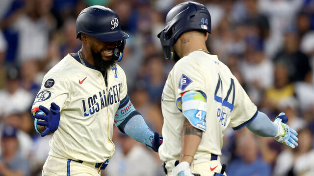 LOS ANGELES, CALIFORNIA - AUGUST 16: Teoscar Hernández #37 of the Los Angeles Dodgers celebrates his home run with teammate Andy Pages #44 during the fifth inning against the San Diego Padres at Dodger Stadium on August 16, 2025 in Los Angeles, California.