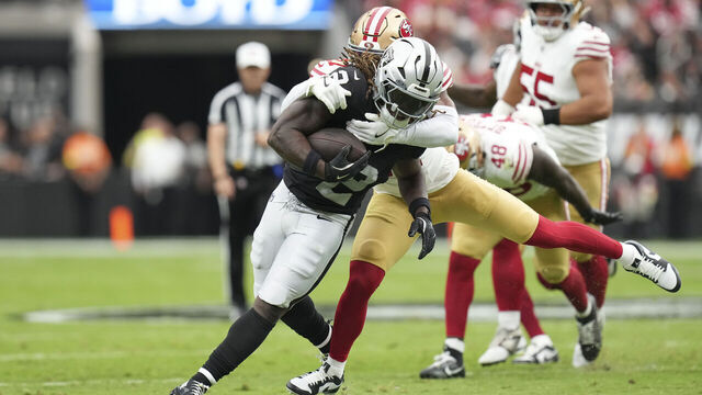 LAS VEGAS, NEVADA - AUGUST 16: Ashton Jeanty #2 of the Las Vegas Raiders is tackled by Ji'Ayir Brown #27 of the San Francisco 49ers in the first quarter during the NFL Preseason 2025 game at Allegiant Stadium on August 16, 2025 in Las Vegas, Nevada.