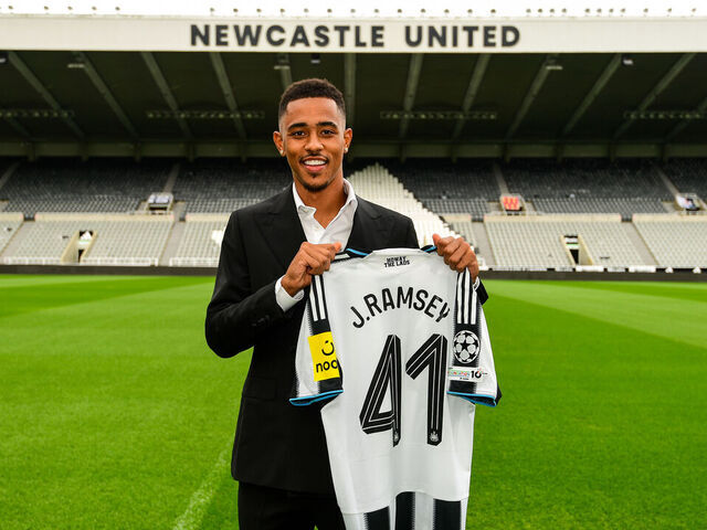 NEWCASTLE UPON TYNE, ENGLAND - AUGUST 17: In this image released on August 17, 2025, Jacob Ramsey poses for photographs after signing for Newcastle United at St. James Park in Newcastle upon Tyne, England.
