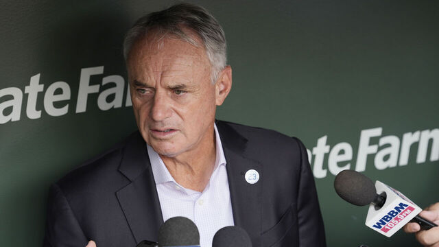 CHICAGO, ILLINOIS - AUGUST 01: Major League Baseball Commissioner Rob Manfred is interviewed during the 2027 Chicago All-Star Game Announcement before a game between the Baltimore Orioles and Chicago Cubs at Wrigley Field on August 01, 2025 in Chicago, Illinois.