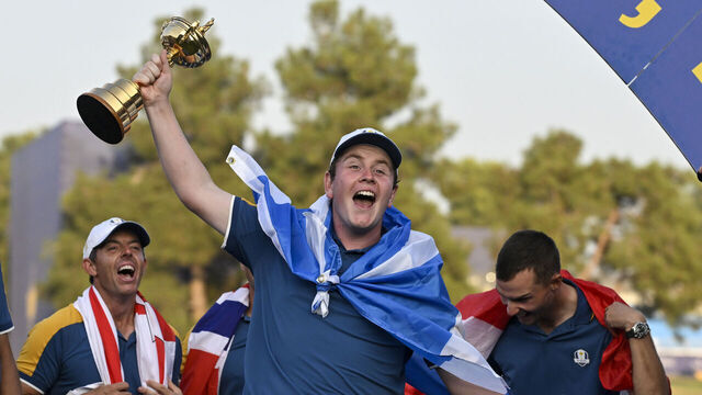 Robert Macintyre of Scotland lifts the trophy as he celebrates with team Europe teammates the victory of the 2023 Ryder Cup at Marco Simone Golf and Country Club. Rome, (Italy), October 1st, 2023