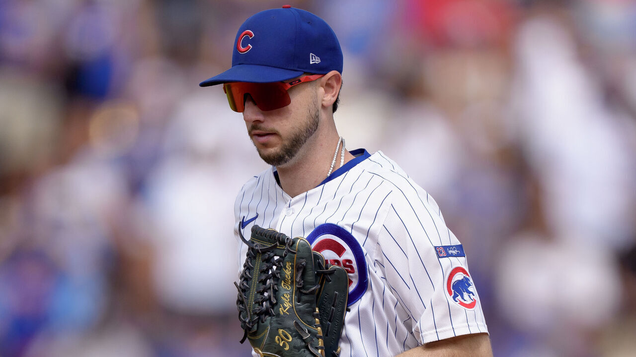 CHICAGO, ILLINOIS - AUGUST 17: Kyle Tucker #30 of the Chicago Cubs exits the field of play in a game against the Pittsburgh Pirates at Wrigley Field on August 17, 2025 in Chicago, Illinois.