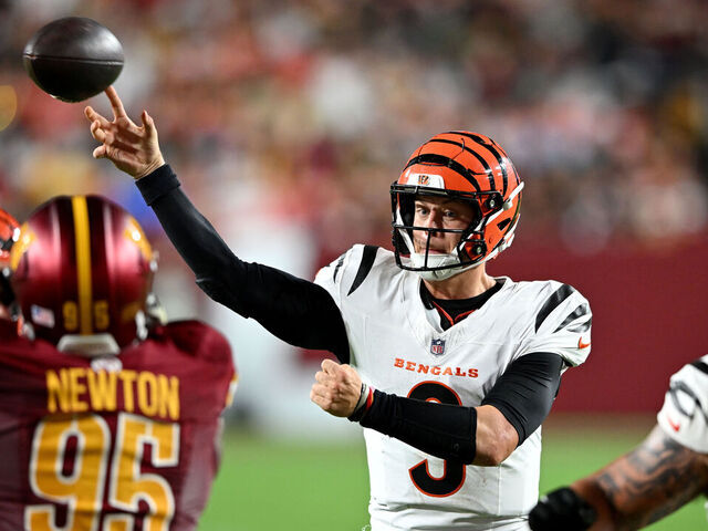 LANDOVER, MARYLAND - AUGUST 18: Joe Burrow #9 of the Cincinnati Bengals throws a touchdown in the second quarter against the Washington Commanders during the NFL Preseason 2025 game between Cincinnati Bengals and Washington Commanders at Northwest Stadium on August 18, 2025 in Landover, Maryland.