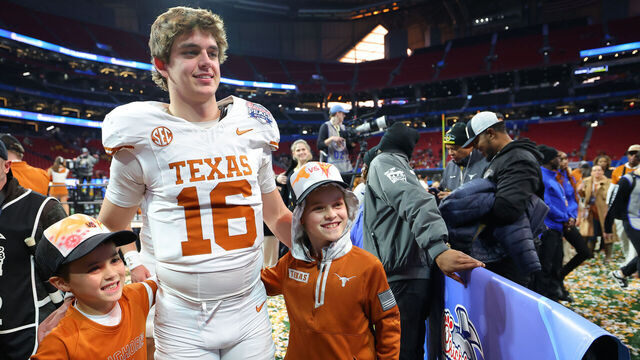 ATLANTA, GEORGIA - JANUARY 01: Arch Manning #16 of the Texas Longhorns poses for a photo after defeating the Arizona State Sun Devils 39-31 during the second overtime in the Chick-fil-A Peach Bowl at Mercedes-Benz Stadium on January 01, 2025 in Atlanta, Georgia.