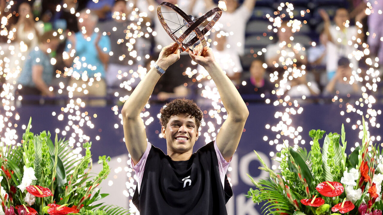 TORONTO, ONTARIO - AUGUST 07: Ben Shelton of United States celebrates with the trophy after defeating Karen Khachanov during the Singles Final of the National Bank Open Presented by Rogers at Sobeys Stadium on August 07, 2025 in Toronto, Ontario.