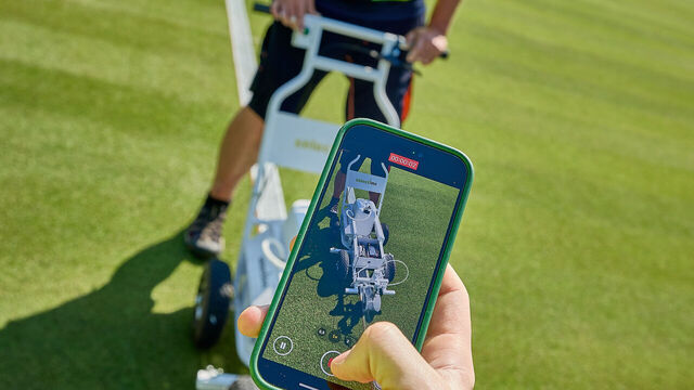 BAD HOMBURG, GERMANY - JUNE 20: A smart phone captures a groundsman painting the white lines on the grass ahead of the Bad Homburg Open powered by Solarwatt on June 20, 2025 in Bad Homburg, Germany.
