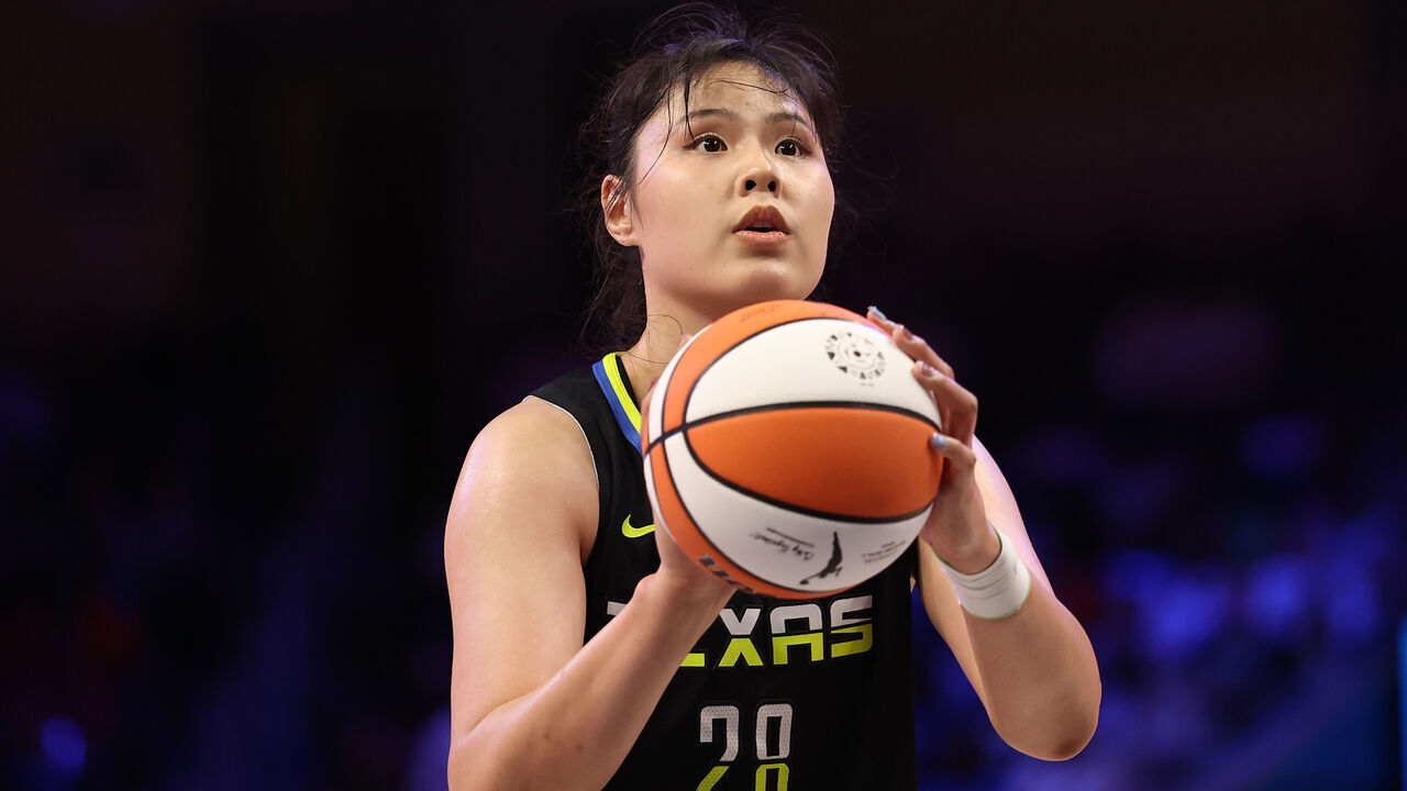 ARLINGTON, TEXAS - JULY 27: Li Yueru #28 of the Dallas Wings shoots a free throw during the first half of a game against the Las Vegas Aces at College Park Center on July 27, 2025 in Arlington, Texas.