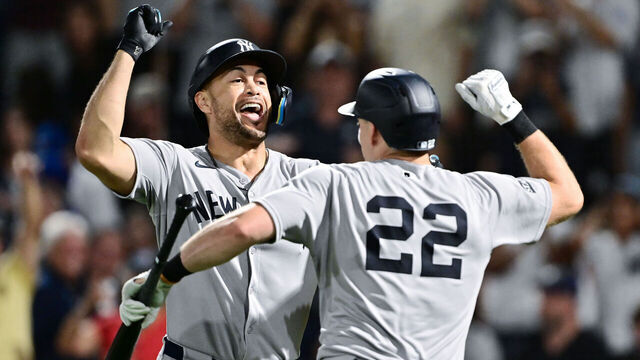 TAMPA, FLORIDA - AUGUST 19: Giancarlo Stanton #27 celebrates with Ben Rice #22 of the New York Yankees after hitting a home run in the first inning against the New York Yankees at George M. Steinbrenner Field on August 19, 2025 in Tampa, Florida.