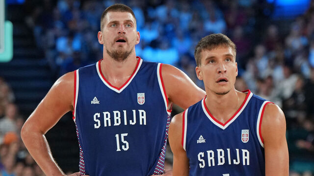 PARIS, FRANCE - AUGUST 10: Nikola Jokic #15 and Bogdan Bogdanovic #7 of the Serbian Men's National Team looks on during the game during the Men's Bronze Medal Game on August 10, 2024 at the AccorHotels Arena in Paris, France. NOTE TO USER: User expressly acknowledges and agrees that, by downloading and/or using this photograph, user is consenting to the terms and conditions of the Getty Images License Agreement. Mandatory Copyright Notice: Copyright 2024 NBAE