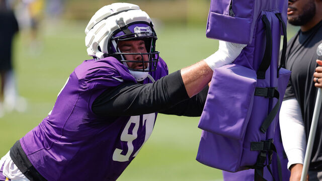 EAGAN, MN - AUGUST 13: Minnesota Vikings defensive tackle Harrison Phillips (97) runs a drill during training camp at TCO Performance Center on August 13, 2025 in Eagan, Minnesota.