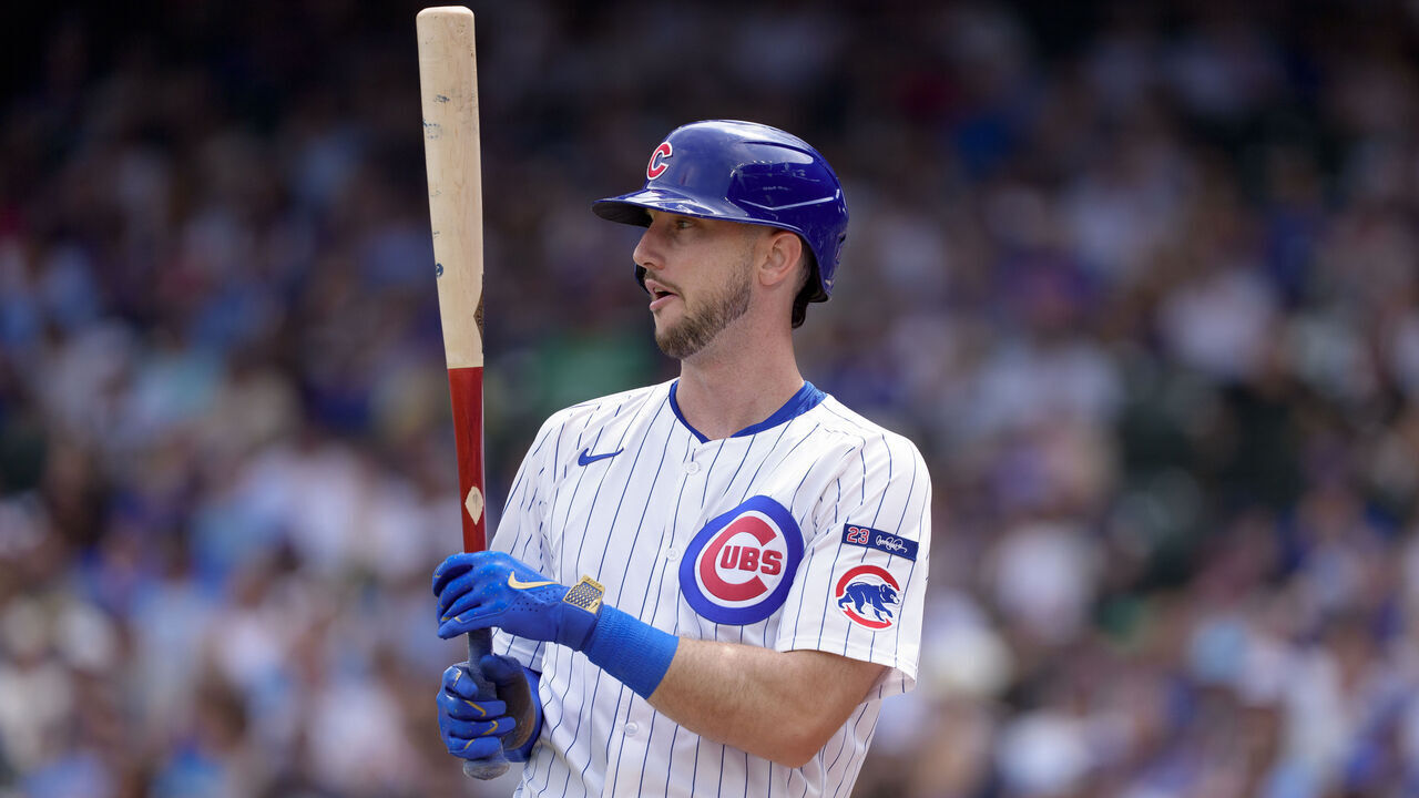 CHICAGO, ILLINOIS - AUGUST 18: Kyle Tucker #30 of the Chicago Cubs looks on from the on deck area in a game against the Milwaukee Brewers at Wrigley Field on August 18, 2025 in Chicago, Illinois.