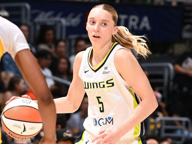 LOS ANGELES, CA - AUGUST 20: Paige Bueckers #5 of the Dallas Wings handles the ball during the game against the Los Angeles Sparks on August 20, 2025 at Crypto.com Arena in Los Angeles, California. NOTE TO USER: User expressly acknowledges and agrees that, by downloading and/or using this Photograph, user is consenting to the terms and conditions of the Getty Images License Agreement. Mandatory Copyright Notice: Copyright 2025 NBAE