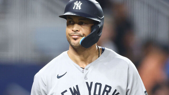 MIAMI, FLORIDA - AUGUST 01: Giancarlo Stanton #27 of the New York Yankees reacts after hitting a three-run home run against the Miami Marlins in the fourth inning of the game at loanDepot park on August 01, 2025 in Miami, Florida.