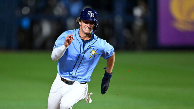 PORT CHARLOTTE, FLORIDA - MARCH 13, 2025: Carson Williams #65 of the Tampa Bay Rays runs to third base on an RBI single hit by Brayden Taylor during the fourth inning of a spring training Spring Breakout game against the Boston Red Sox at Charlotte Sports Complex on March 13, 2025 in Port Charlotte, Florida.