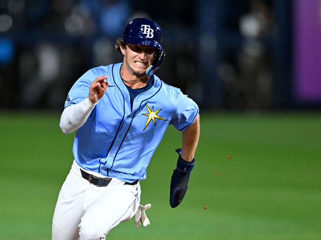 PORT CHARLOTTE, FLORIDA - MARCH 13, 2025: Carson Williams #65 of the Tampa Bay Rays runs to third base on an RBI single hit by Brayden Taylor during the fourth inning of a spring training Spring Breakout game against the Boston Red Sox at Charlotte Sports Complex on March 13, 2025 in Port Charlotte, Florida.