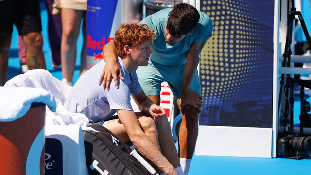 CINCINNATI, OH - AUGUST 18: Carlos Alcaraz of Spain talks with Jannik Sinner of Italy. Alcaraz won due to an early retirement by Sinner during the championship match at the Cincinnati Open at the Lindner Family Tennis Center on August 18, 2025 in Mason, OH.