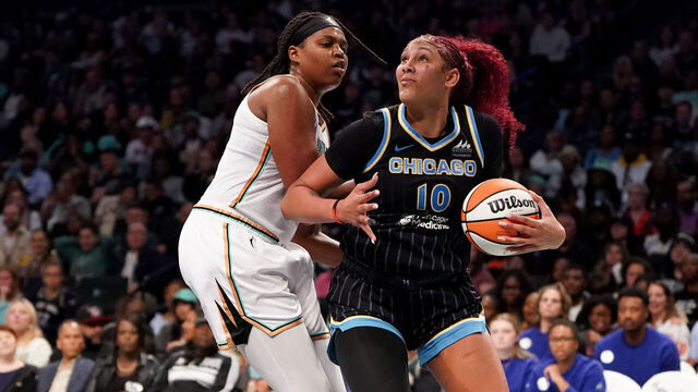 NEW YORK, NEW YORK - AUGUST 21: Kamilla Cardoso #10 of the Chicago Sky goes to the basket as Jonquel Jones #35 of the New York Liberty defends during the third quarter at Barclays Center on August 21, 2025 in New York City.