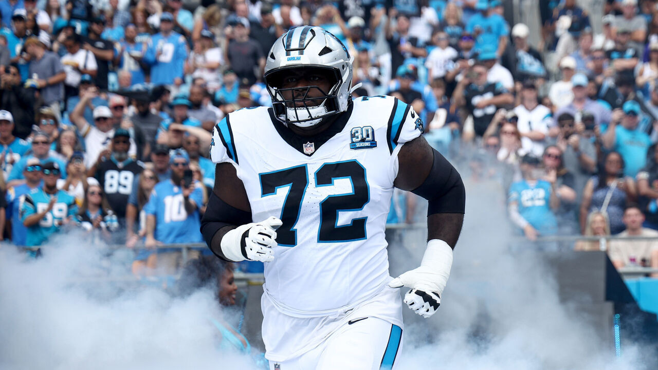 CHARLOTTE, NORTH CAROLINA - SEPTEMBER 15: Offensive tackle Taylor Moton #72 takes the field prior to the game against the Los Angeles Chargers at Bank of America Stadium on September 15, 2024 in Charlotte, North Carolina.