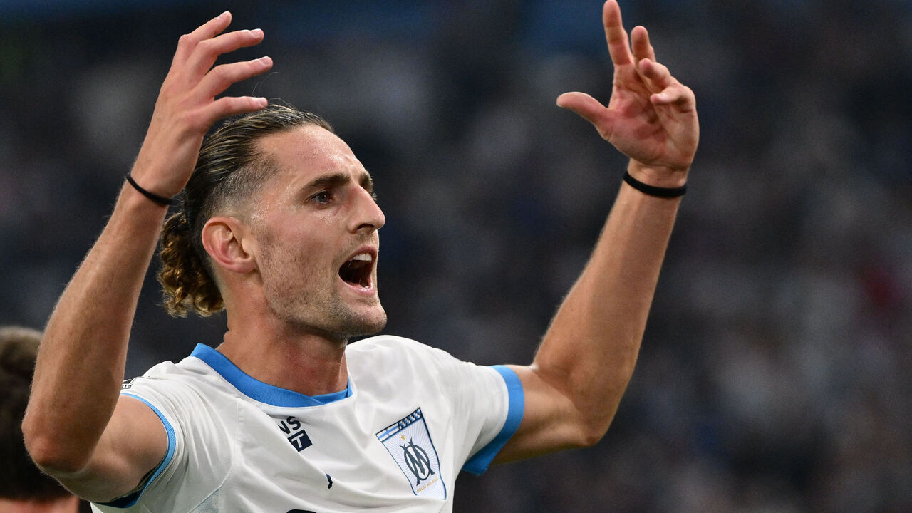 Marseille's French midfielder #25 Adrien Rabiot celebrates after scoring during their ligue 1 football match Olympic of Marseille (OM) against stade Rennais at the Velodrome stadium in Marseille on May 17, 2025.