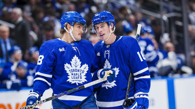 TORONTO, ON - JANUARY 14: Mitch Marner #16 speaks with William Nylander #88 of the Toronto Maple Leafs during the third period against the Dallas Stars at the Scotiabank Arena on January 14, 2025 in Toronto, Ontario, Canada.
