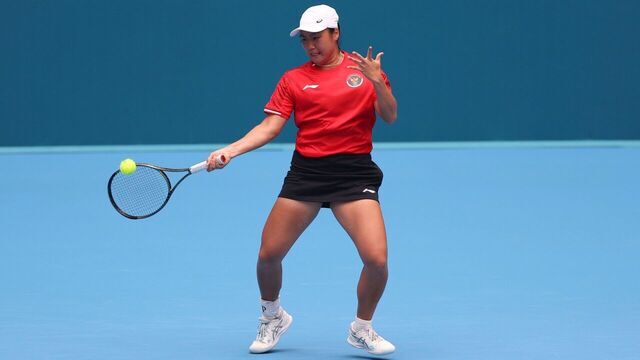 Janice Tjen of Indonesia competes during the Women's Singles Round match of Tennis between Zhu Lin of China and Janice Tjen of Indonesia at the 19th Asian Games in Hangzhou, east China's Zhejiang Province, Sept. 26, 2023.