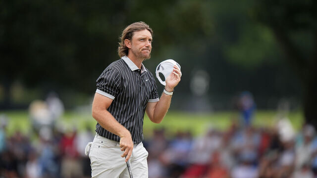 ATLANTA, GEORGIA - AUGUST 22: Tommy Fleetwood of England finishes the round on the 18th green during the second round of TOUR Championship at East Lake Golf Club on August 22, 2025 in Atlanta, Georgia.