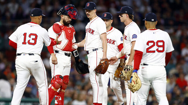 Boston, MA - August 19: Boston Red Sox starting pitcher Walker Buehler is removed from the game by manager Alex Cora in the fifth inning at Fenway Park on August 19, 2025.