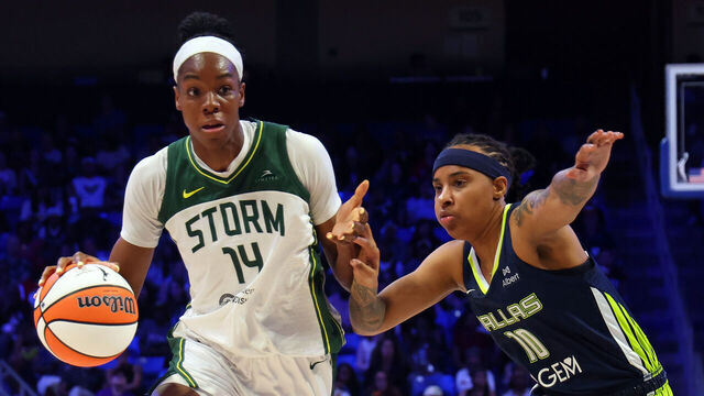 ARLINGTON, TEXAS - AUGUST 22: Dominique Malonga #14 of the Seattle Storm drives the ball past guard Aziaha James #10 of the Dallas Wings at College Park Center on August 22, 2025 in Arlington, Texas.