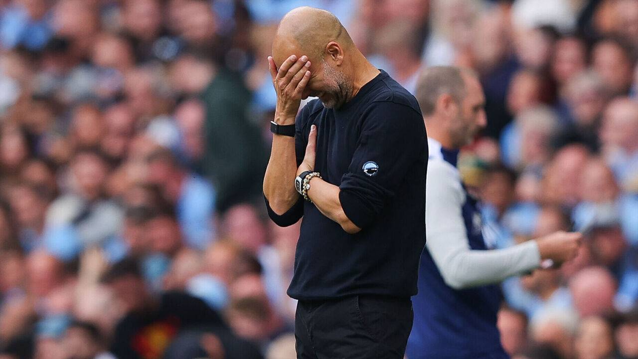 MANCHESTER, ENGLAND - AUGUST 23: Josep 'Pep' Guardiola, head coach of Manchester City, reacts after a missed chance during the Premier League match between Manchester City and Tottenham Hotspur at Etihad Stadium on August 23, 2025 in Manchester, England.