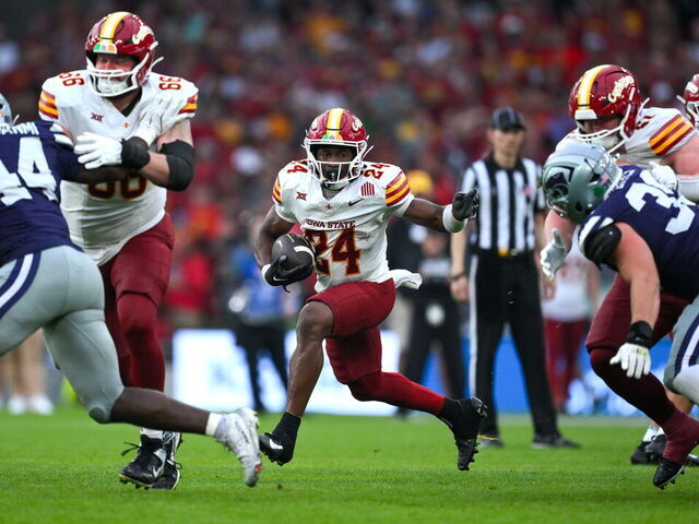 Dublin , Ireland - 23 August 2025; Iowa State Cyclones running back Abu Sama III #24, centre, makes a run during the 2025 Aer Lingus College Football Classic match between Kansas State University and Iowa State University at the Aviva Stadium in Dublin.
