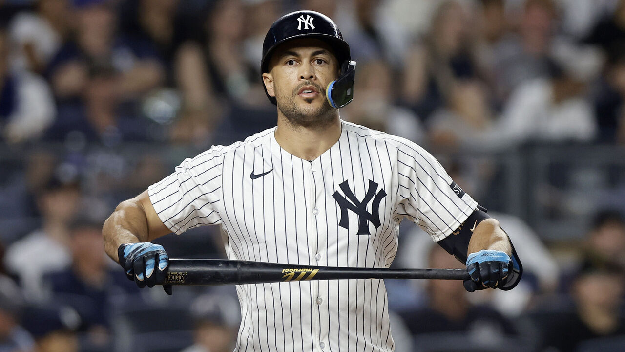 NEW YORK, NEW YORK - AUGUST 13: Giancarlo Stanton #27 of the New York Yankees reacts after striking out during the sixth inning against the Minnesota Twins at Yankee Stadium on August 13, 2025 in New York City.