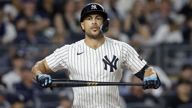 NEW YORK, NEW YORK - AUGUST 13: Giancarlo Stanton #27 of the New York Yankees reacts after striking out during the sixth inning against the Minnesota Twins at Yankee Stadium on August 13, 2025 in New York City.