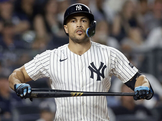 NEW YORK, NEW YORK - AUGUST 13: Giancarlo Stanton #27 of the New York Yankees reacts after striking out during the sixth inning against the Minnesota Twins at Yankee Stadium on August 13, 2025 in New York City.