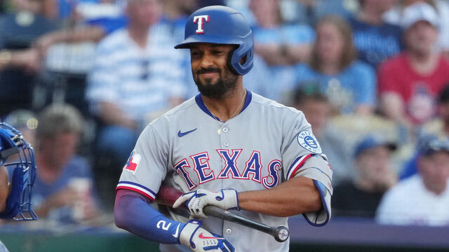 KANSAS CITY, MISSOURI - AUGUST 20: Marcus Semien #2 of the Texas Rangers prepares to bat in the first inning against the Texas Rangers at Kauffman Stadium on August 20, 2025 in Kansas City, Missouri.