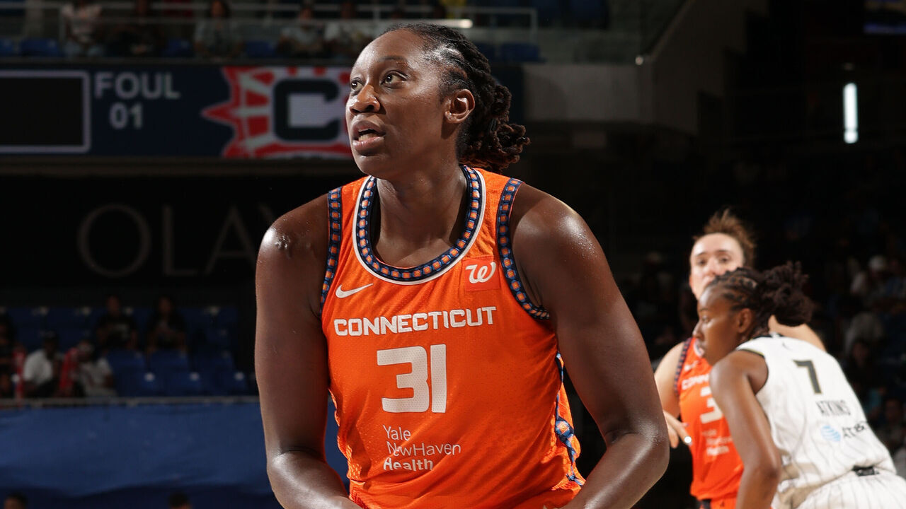 CHICAGO, IL - AUGUST 23: Tina Charles #31 of the Connecticut Sun handles the ball during the game against the Chicago Sky on August 23, 2025 at the Wintrust Arena in Chicago, IL. Mandatory Copyright Notice: Copyright 2025 NBAE