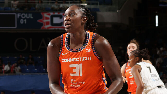 CHICAGO, IL - AUGUST 23: Tina Charles #31 of the Connecticut Sun handles the ball during the game against the Chicago Sky on August 23, 2025 at the Wintrust Arena in Chicago, IL. Mandatory Copyright Notice: Copyright 2025 NBAE