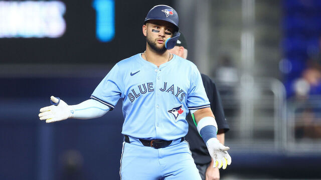 MIAMI, FLORIDA - AUGUST 22: Bo Bichette #11 of the Toronto Blue Jays reacts after hitting a double against the Miami Marlins in the first inning of the game at loanDepot park on August 22, 2025 in Miami, Florida.