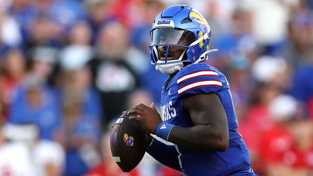 LAWRENCE, KANSAS - AUGUST 23: Quarterback Jalon Daniels #6 of the Kansas Jayhawks looks to pass during the second half of the game against the Fresno State Bulldogs at David Booth Kansas Memorial Stadium on August 23, 2025 in Lawrence, Kansas.