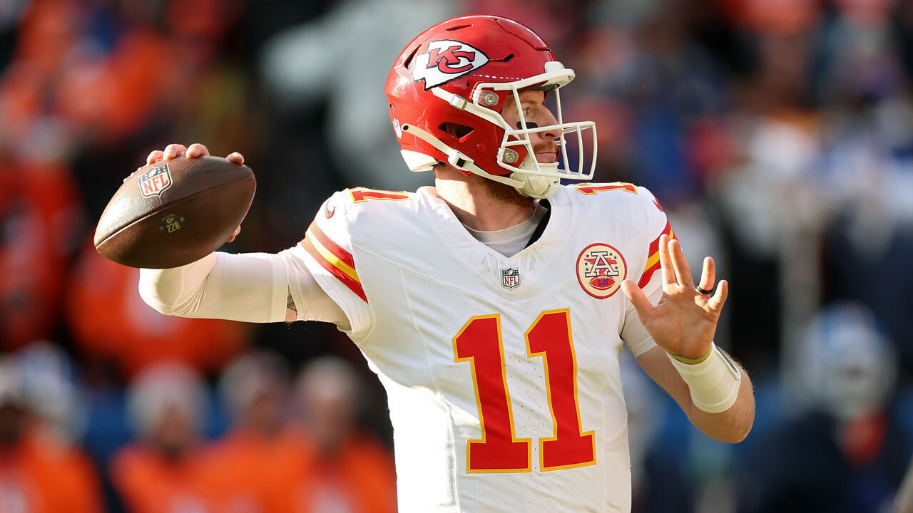 DENVER, COLORADO - JANUARY 05: Carson Wentz #11 of the Kansas City Chiefs throws a pass in the first quarter against the Denver Broncos at Empower Field At Mile High on January 05, 2025 in Denver, Colorado.