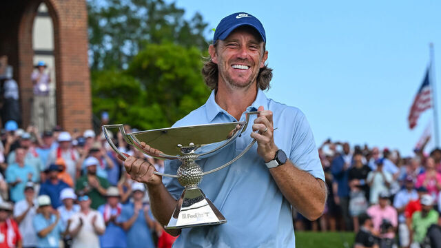 ATLANTA, GA - AUGUST 24: Tommy Fleetwood (ENG) with the FedEx Cup Trophy after the final round of the PGA Tour Championship, August 24, 2025 at East Lake Golf Club in Atlanta, Georgia.