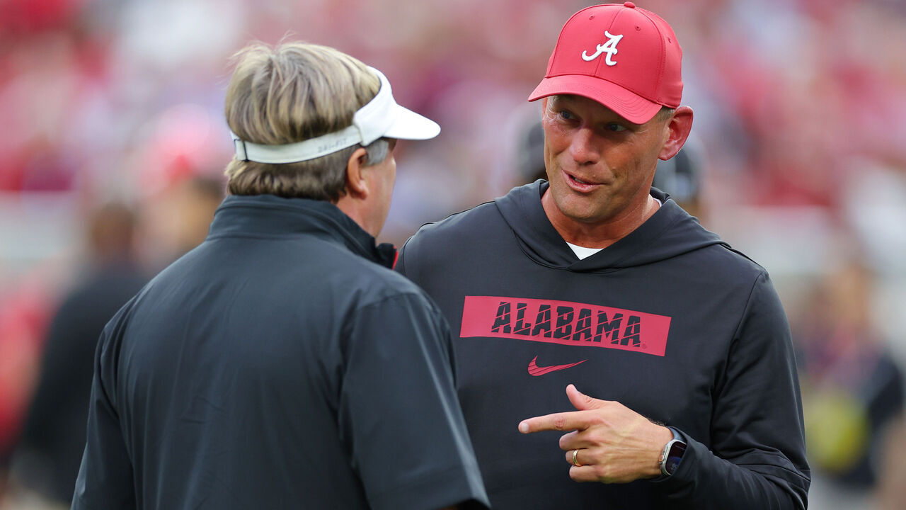 TUSCALOOSA, ALABAMA - SEPTEMBER 28: Head coach Kalen DeBoer of the Alabama Crimson Tide speaks to head coach Kirby Smart of the Georgia Bulldogs before the game at Bryant-Denny Stadium on September 28, 2024 in Tuscaloosa, Alabama.