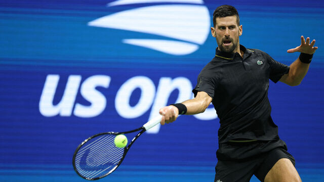 Serbia's Novak Djokovic returns the ball to USA's Learner Tien during their men's singles first round tennis match on day one of the US Open tennis tournament at the USTA Billie Jean King National Tennis Center in New York City, on August 24, 2025.