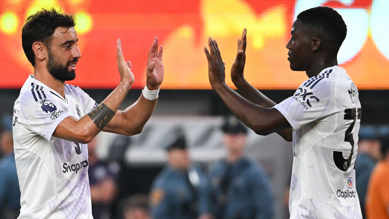EAST RUTHERFORD, NEW JERSEY - JULY 26: Bruno Fernandes #8 of Manchester United celebrates scoring with teammate Kobbie Mainoo #37 during the second half of a Premier League Summer Series match against West Ham United at MetLife Stadium on July 26, 2025 in East Rutherford, New Jersey.