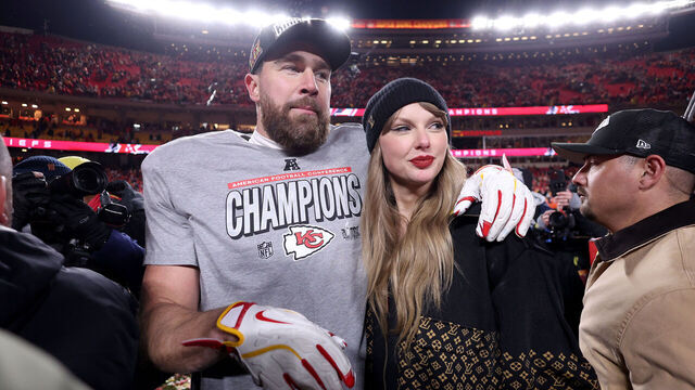 KANSAS CITY, MISSOURI - JANUARY 26: Taylor Swift celebrates with Travis Kelce #87 of the Kansas City Chiefs after defeating the Buffalo Bills 32-29 in the AFC Championship Game at GEHA Field at Arrowhead Stadium on January 26, 2025 in Kansas City, Missouri.