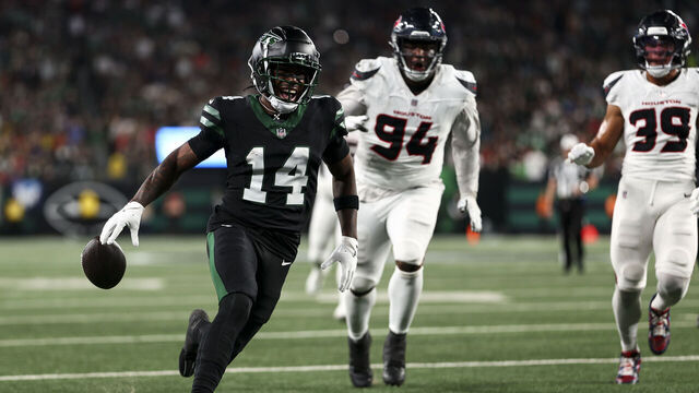 EAST RUTHERFORD, NEW JERSEY - OCTOBER 31: Malachi Corley #14 of the New York Jets fumbles the ball on the one-yard line during the first half of an NFL football game against the Houston Texans, at MetLife Stadium on October 31, 2024 in East Rutherford, New Jersey.